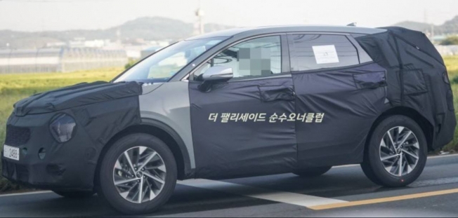 KIA Sportage 2021 - foto espía lateral